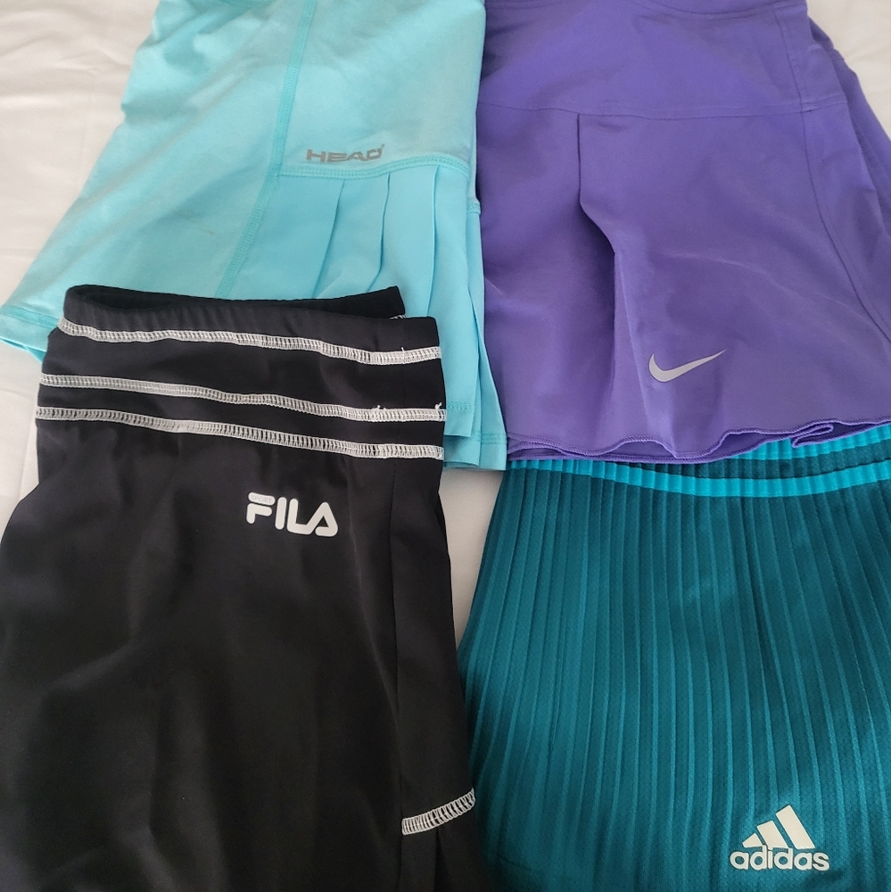 Four size small tennis skirts.